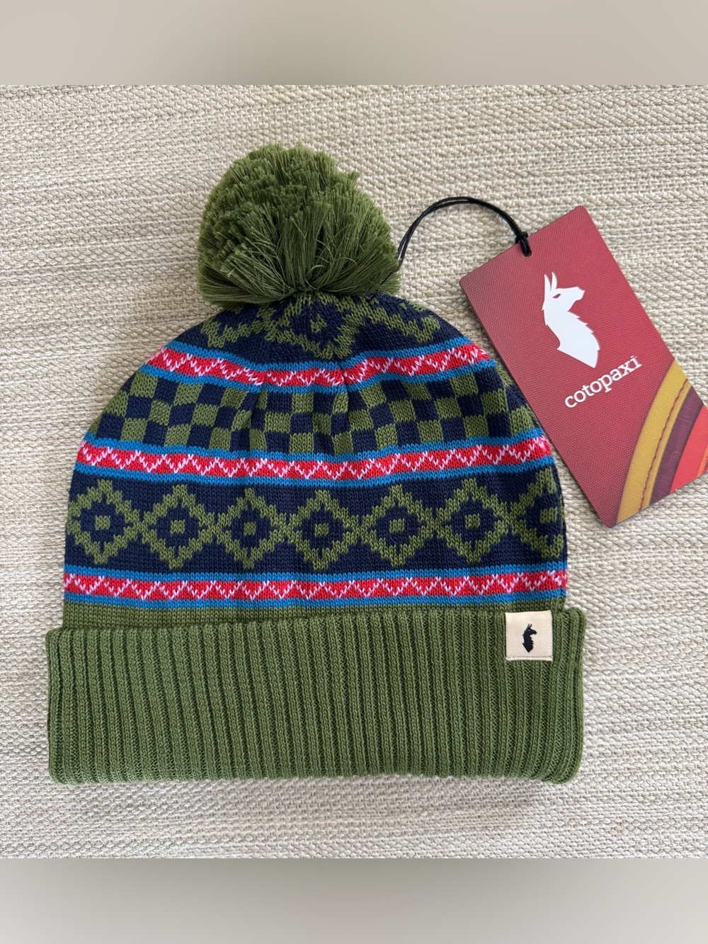 Cotopaxi Cumbre Beanie retro knit pattern Pom Pom fold over cuff one size NWT